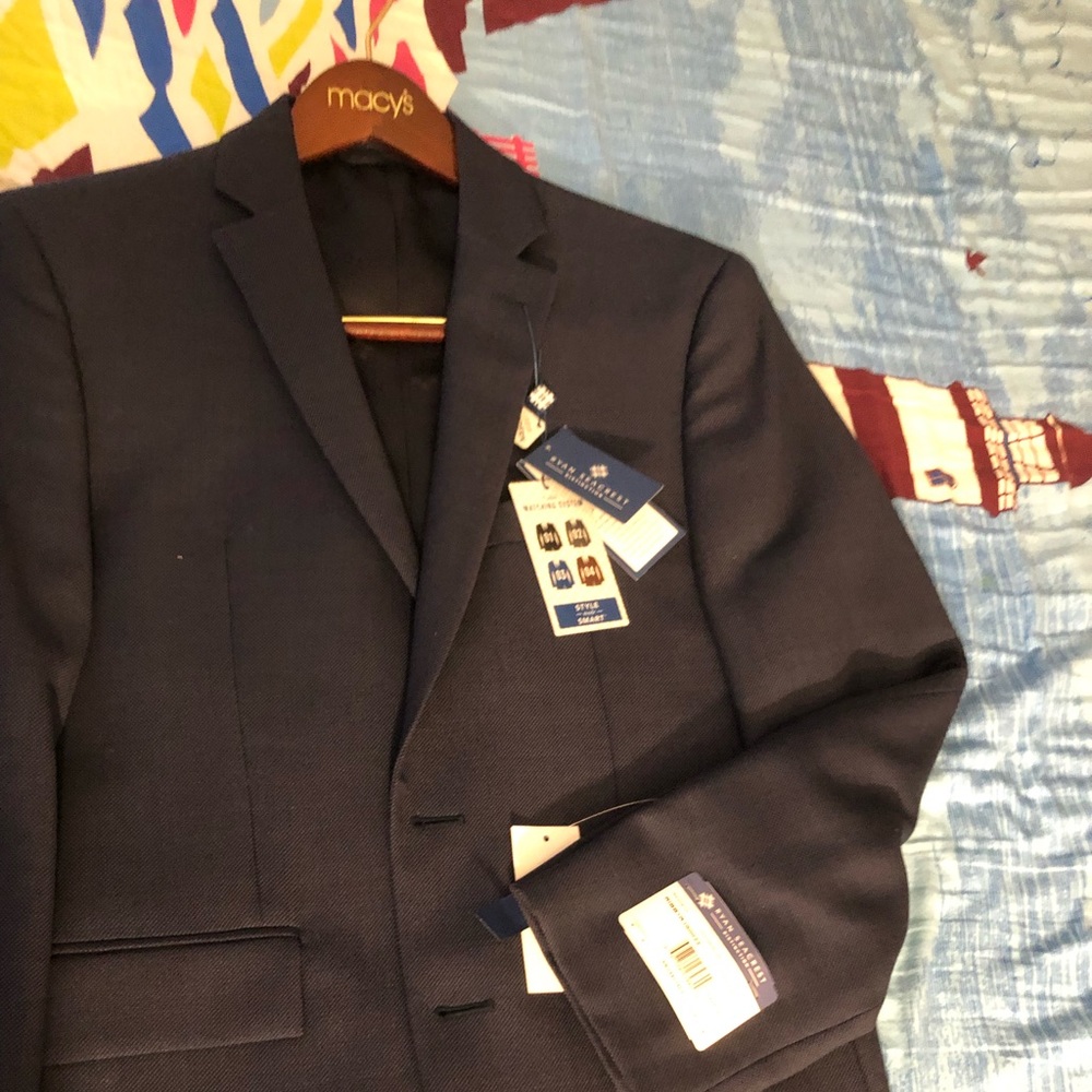 Brand new tagged suit